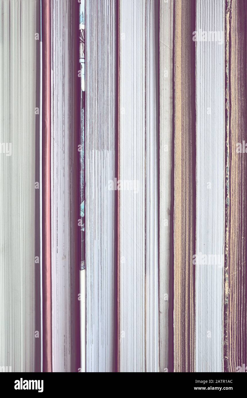 Sfondo del libro composto da molti blocchi di testo, con toni di colore applicati. Foto Stock