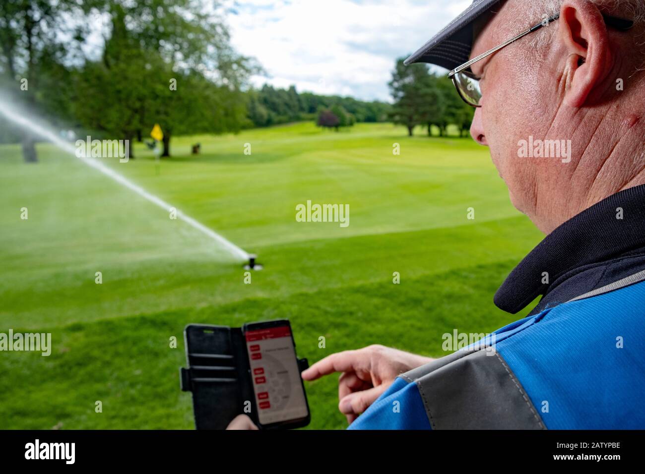 Sistema di irrigazione su campo da golf Foto Stock
