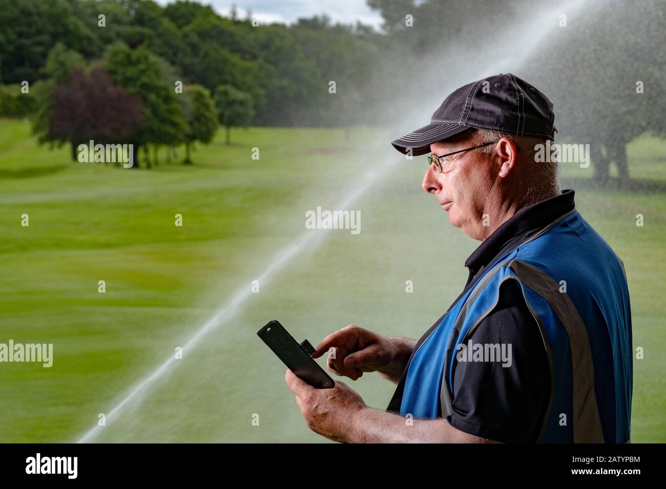 Sistema di irrigazione su campo da golf Foto Stock