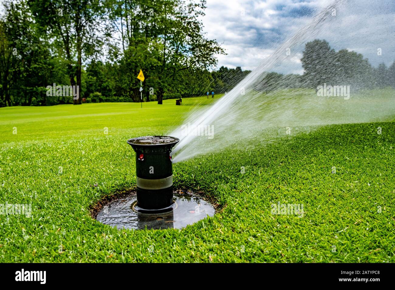 Sistema di irrigazione su campo da golf Foto Stock