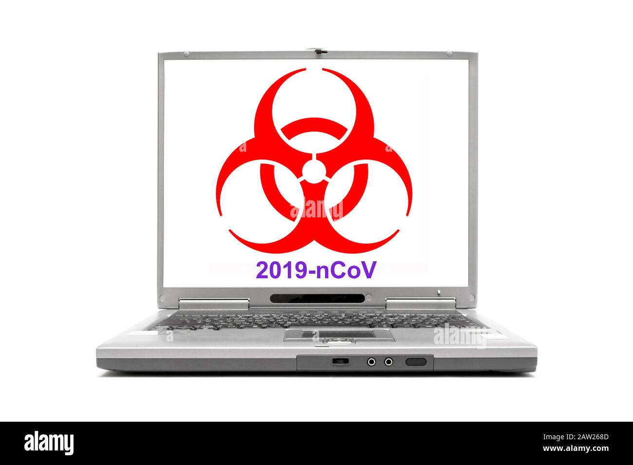 laptop con segnale di avvertimento: rischio biologico, coronavirus Foto Stock