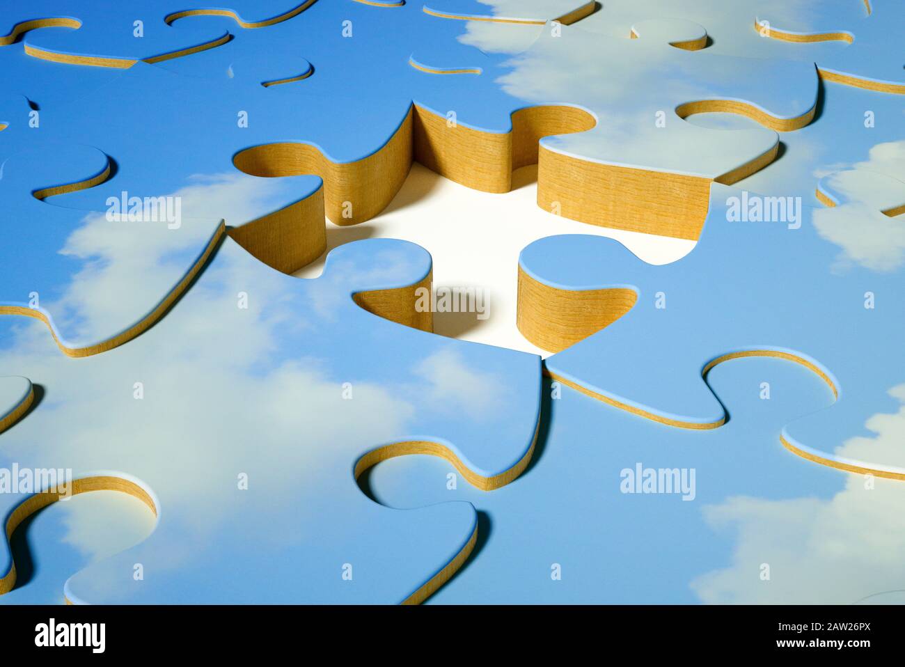 Puzzle cielo blu con un pezzo mancante Foto Stock