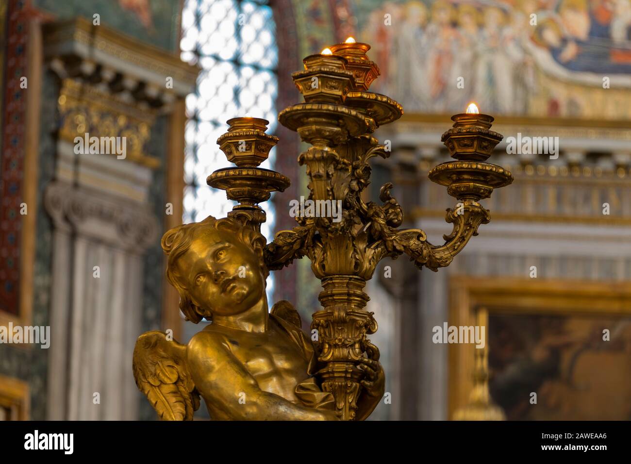 Angel lampada di candele.Santa Maria maggiore Roma Italia Foto Stock