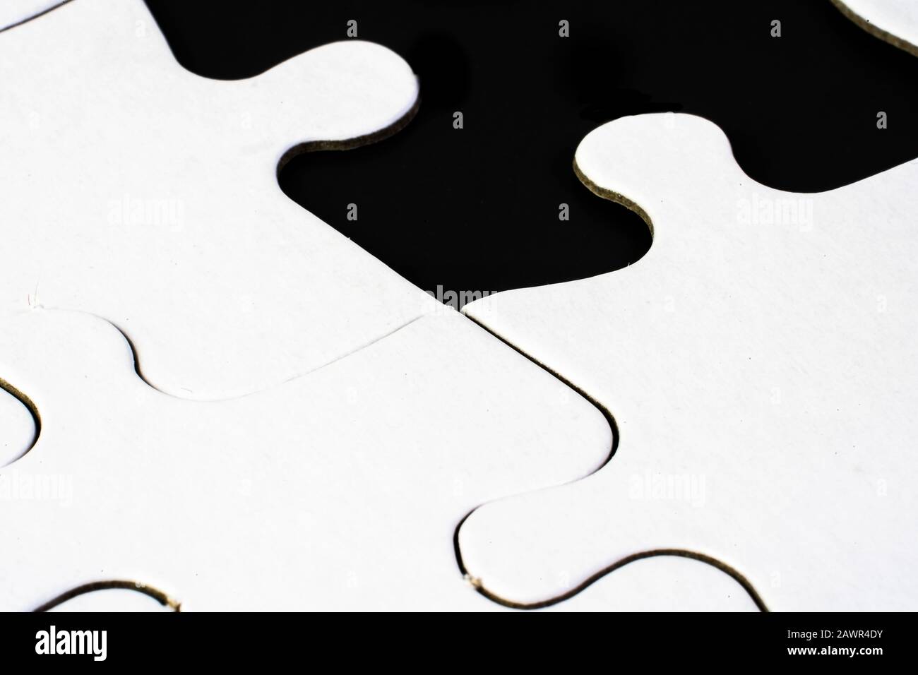 Illustrazione di pezzi in bianco e nero di un puzzle Foto Stock