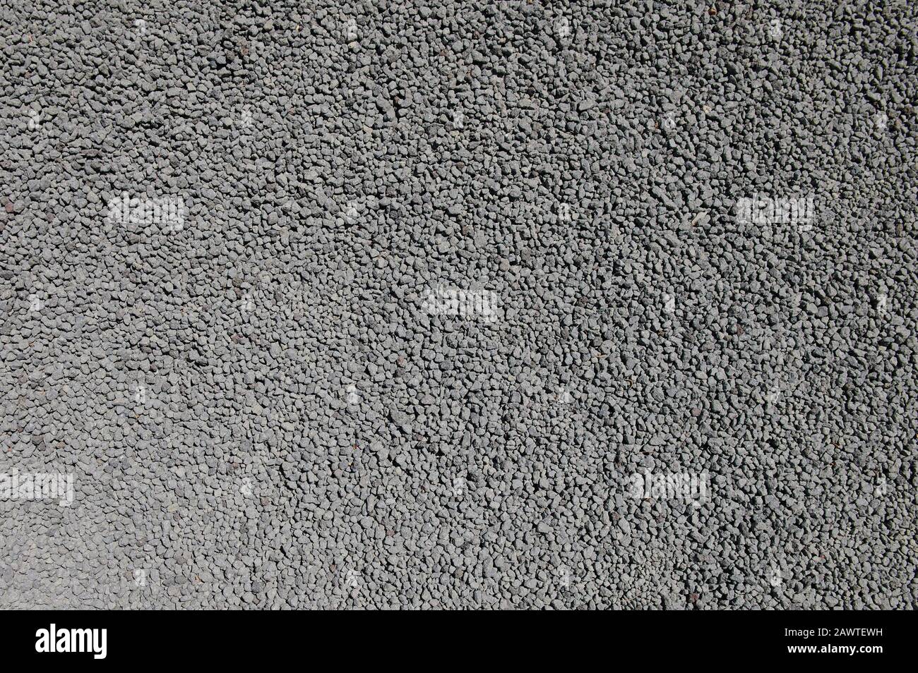 Sfondo trama ghiaia. Modello di piccola roccia per pavimento Foto Stock