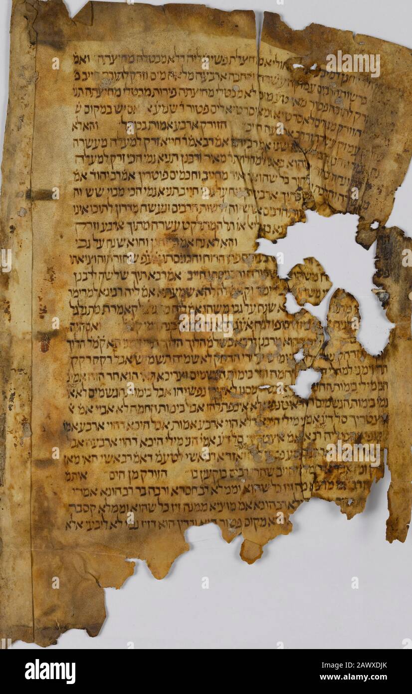 Cairo Geniza - Frammento dal Talmud un antico testo ebraico del 11th secolo. Manoscritto scritto su pergamena in scrittura orientale Foto Stock