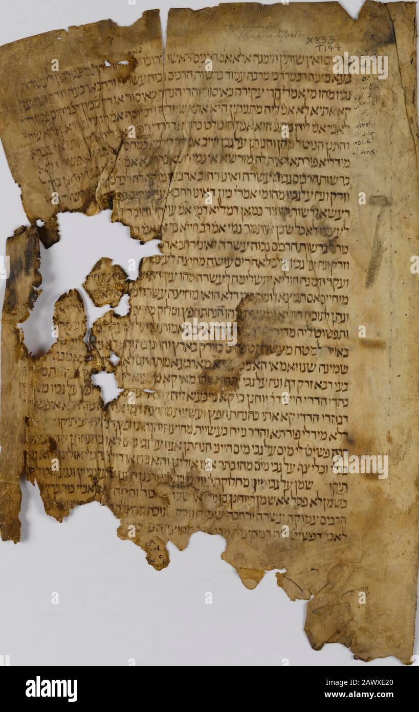 Cairo Geniza - Frammento dal Talmud un antico testo ebraico del 11th secolo. Manoscritto scritto su pergamena in scrittura orientale Foto Stock