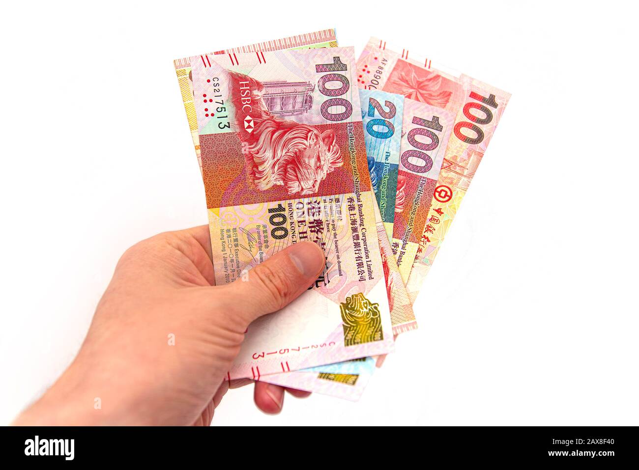 Hong Kong Currency 100, 20 e HSBC Bank Emblem a Hong Kong Foto Stock