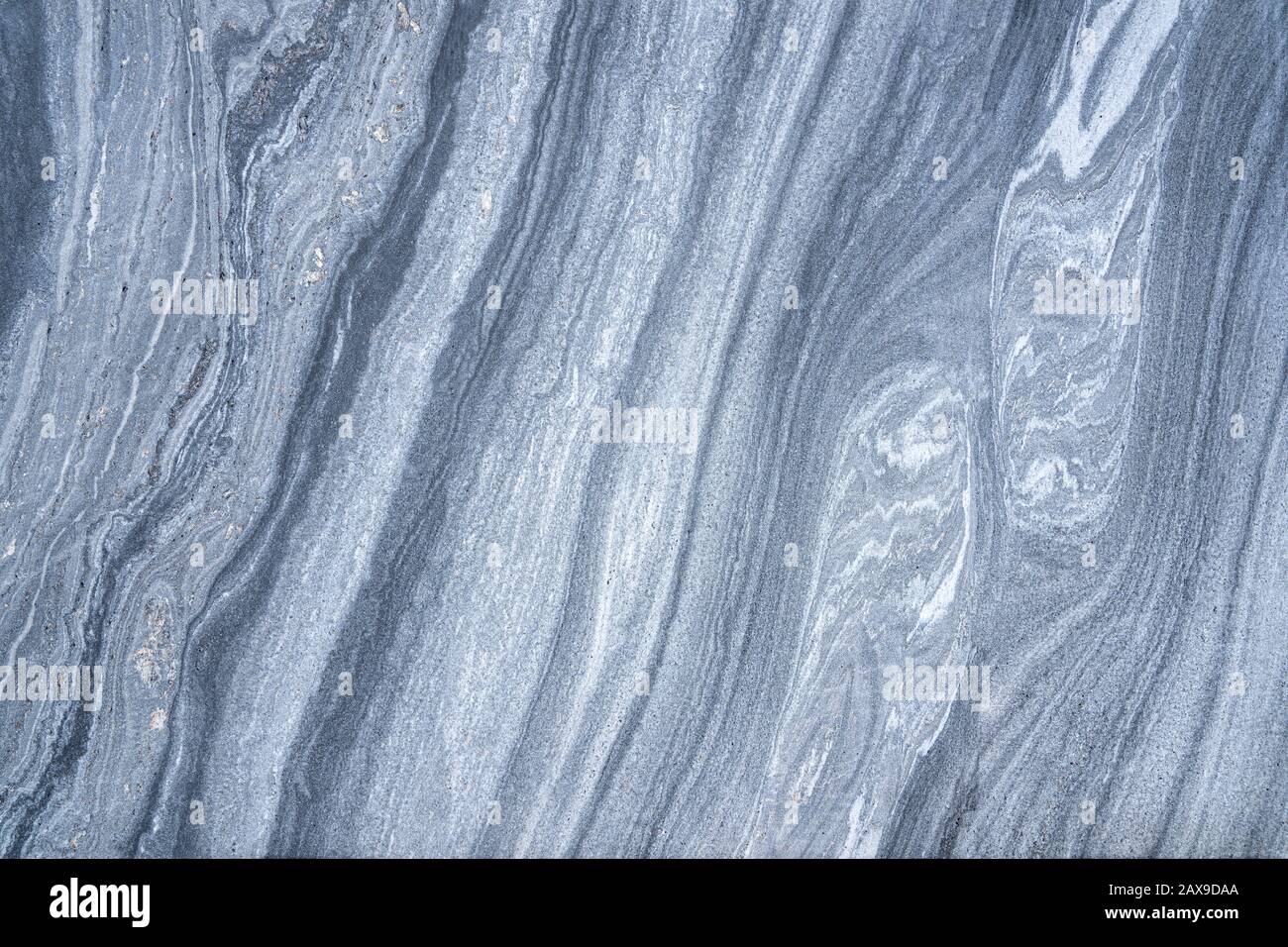 Disegno grigio astratto in una lastra di pietra liscia Foto Stock