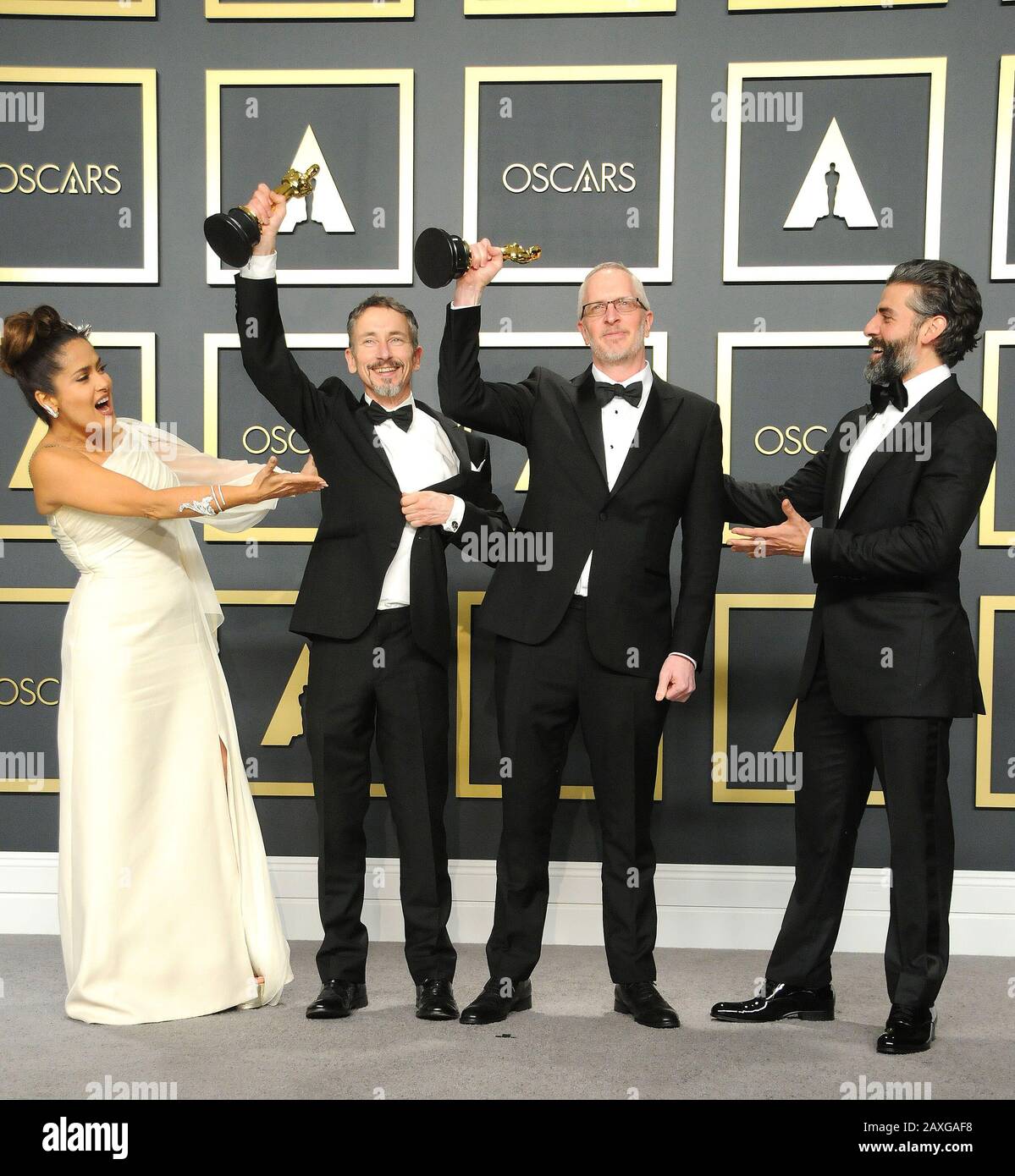 9 Febbraio 2020, Los Angeles, California, Stati Uniti: Febbraio 9th 2020 - Los Angeles, California USA - Sound Mixing Editors MARK TAYLOR and STUART WILSON Winners for Film ''1917'' Presenter/Actress SALMA HAYEK Preenter/Actor OSCAR ISAAC at the ''92nd Academy Awards' - Sala stampa tenuta presso il Dolby Theatre di Los Angeles CA (Credit Image: © Paul Fenton/ZUMA Wire) Foto Stock