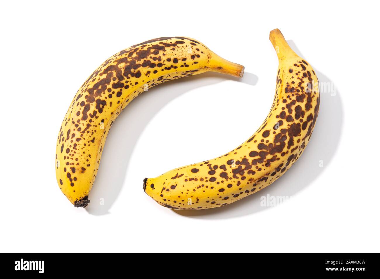 Banana macchiato isolato su sfondo bianco Foto Stock