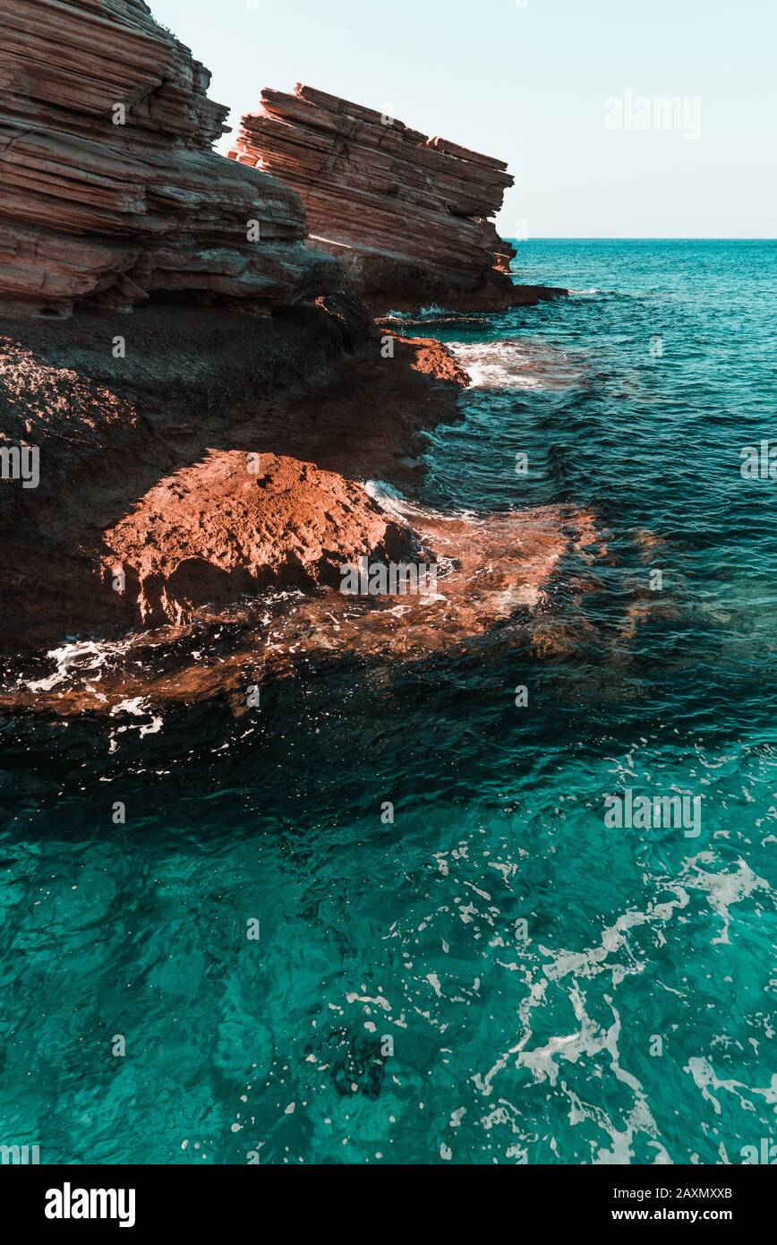 Rocce in acqua alla spiaggia di Triopetra, Creta, Grecia Foto Stock
