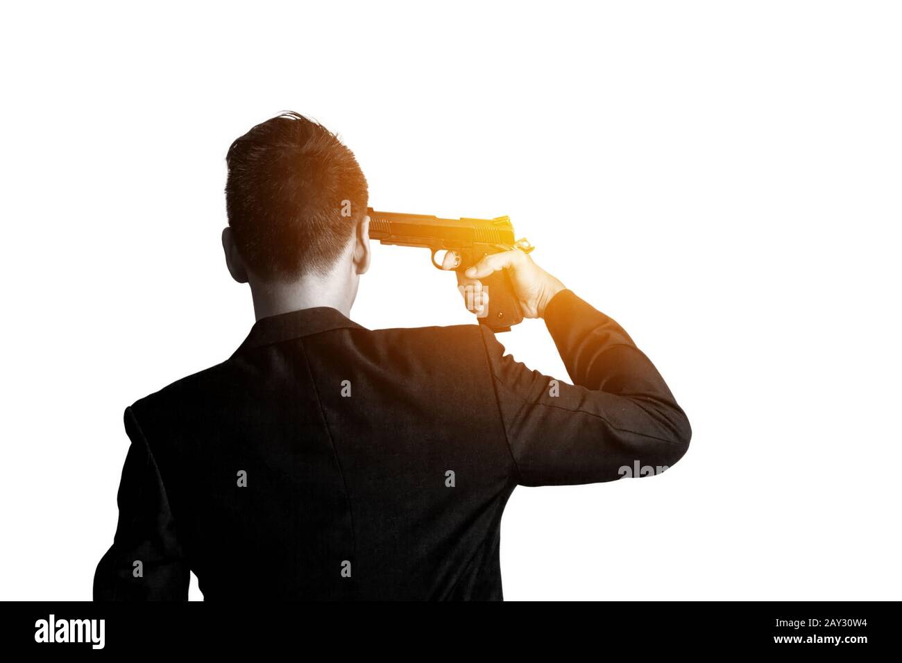 l'uomo con pistola accesa la testa vuole suicidarsi Foto Stock