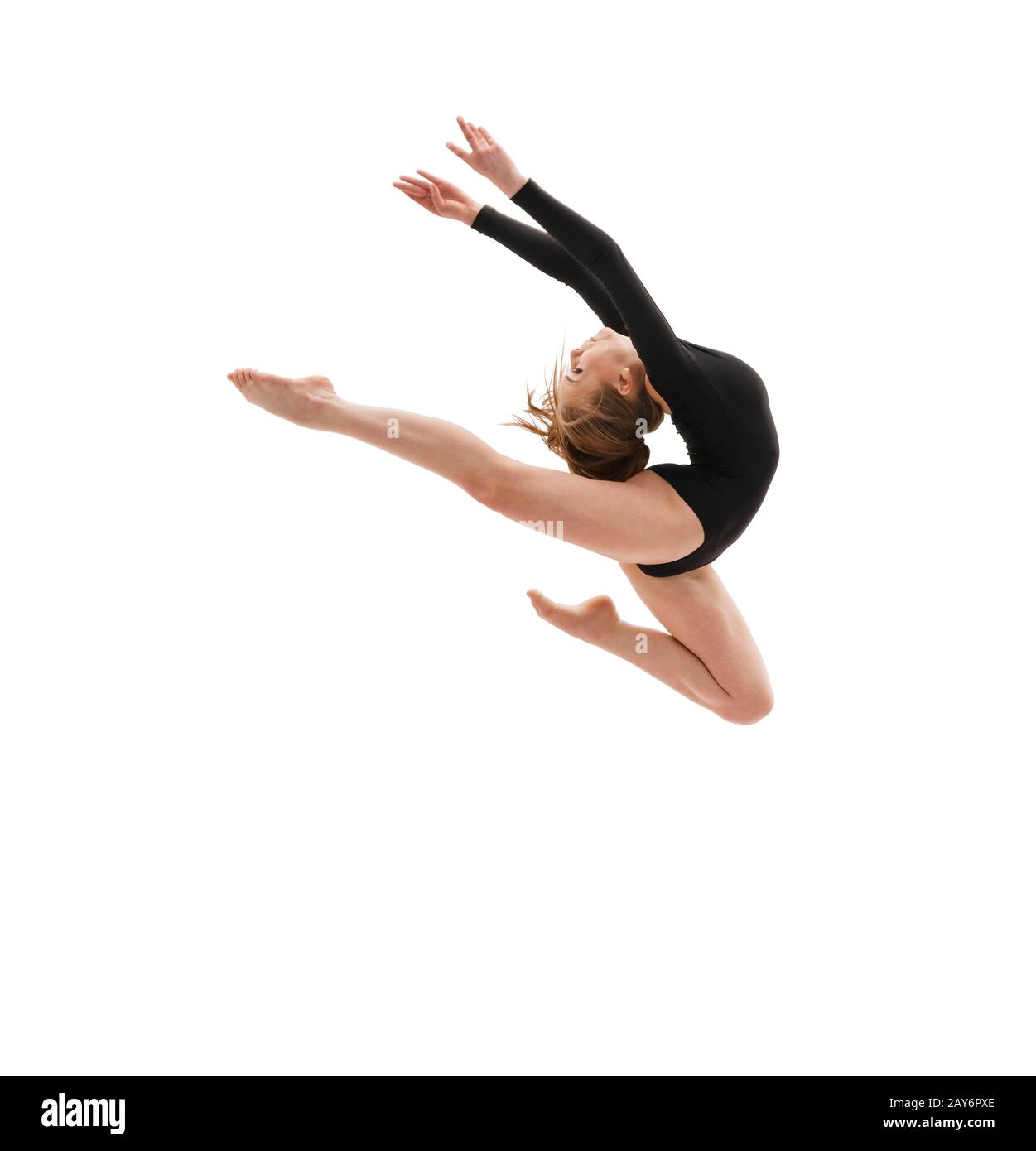 Giovane ginnasta slim in salto gracefull studio shot Foto Stock