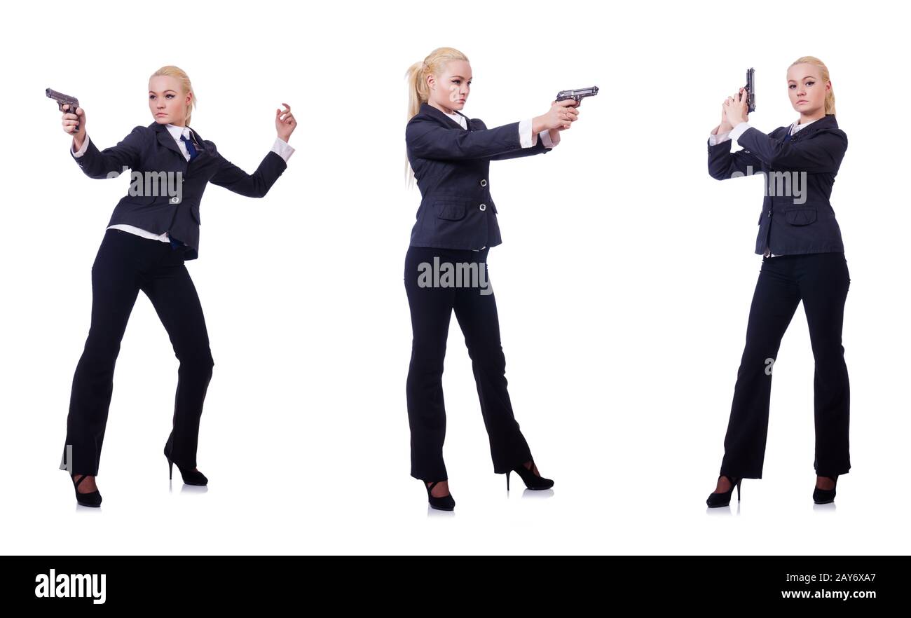 Donna con la pistola isolato su bianco Foto Stock