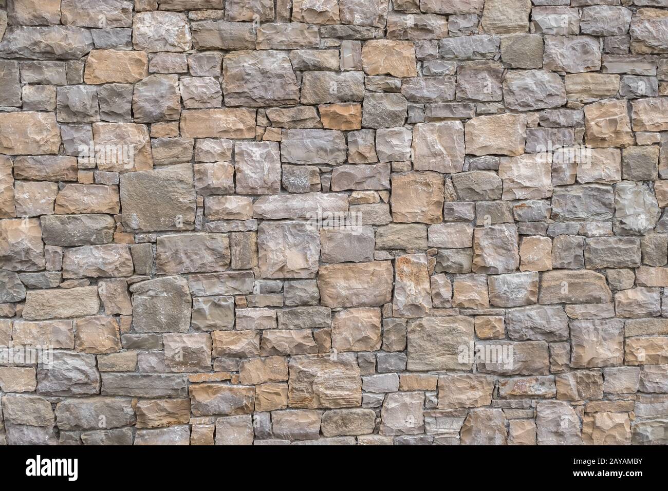 Decorativi ed irregolare della parete di pietra Foto Stock