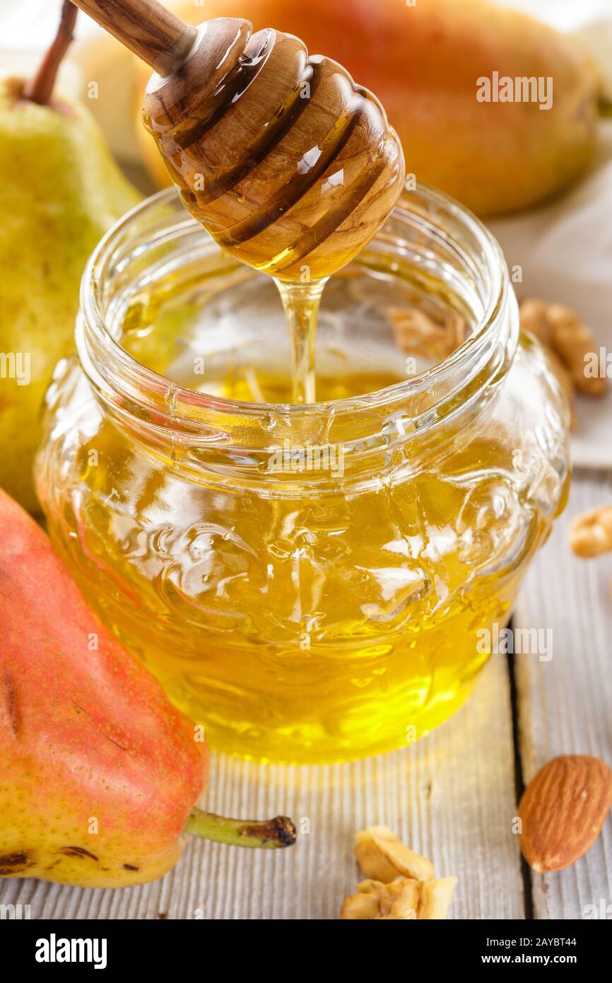 Il miele, pere, noci e mandorle Foto Stock