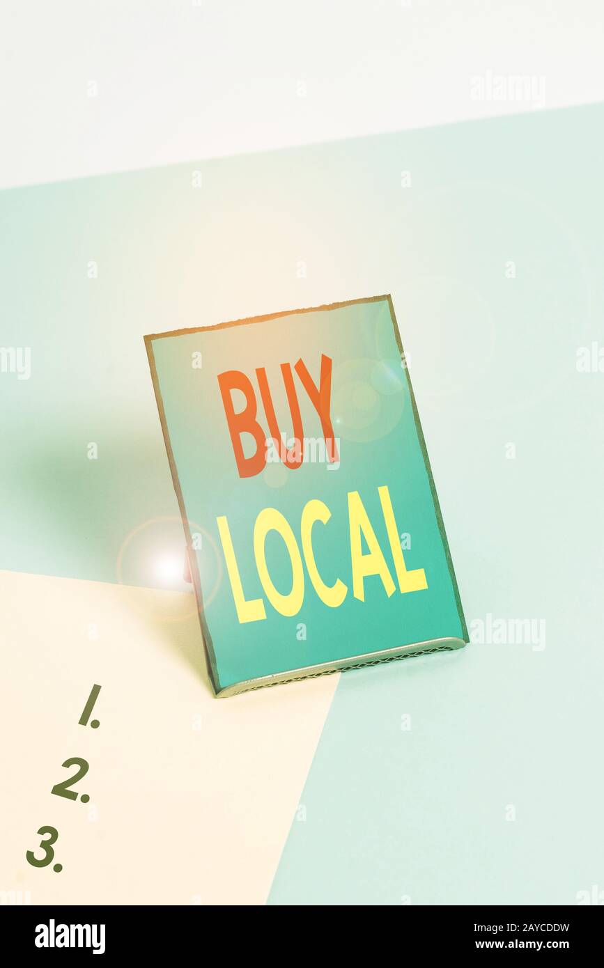 Nota di scrittura che mostra Buy Local (Acquista locale). Foto di affari che mostra i prodotti patronizing che isoriginaly ha fatto originaly o nativo. Foto Stock