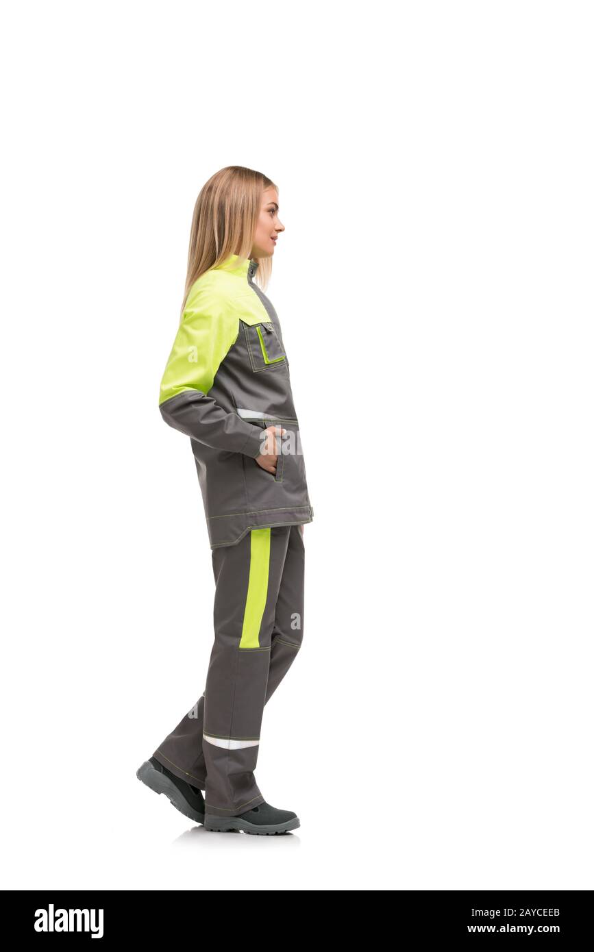 Bionda in abiti da lavoro vista profilo isolata Foto Stock