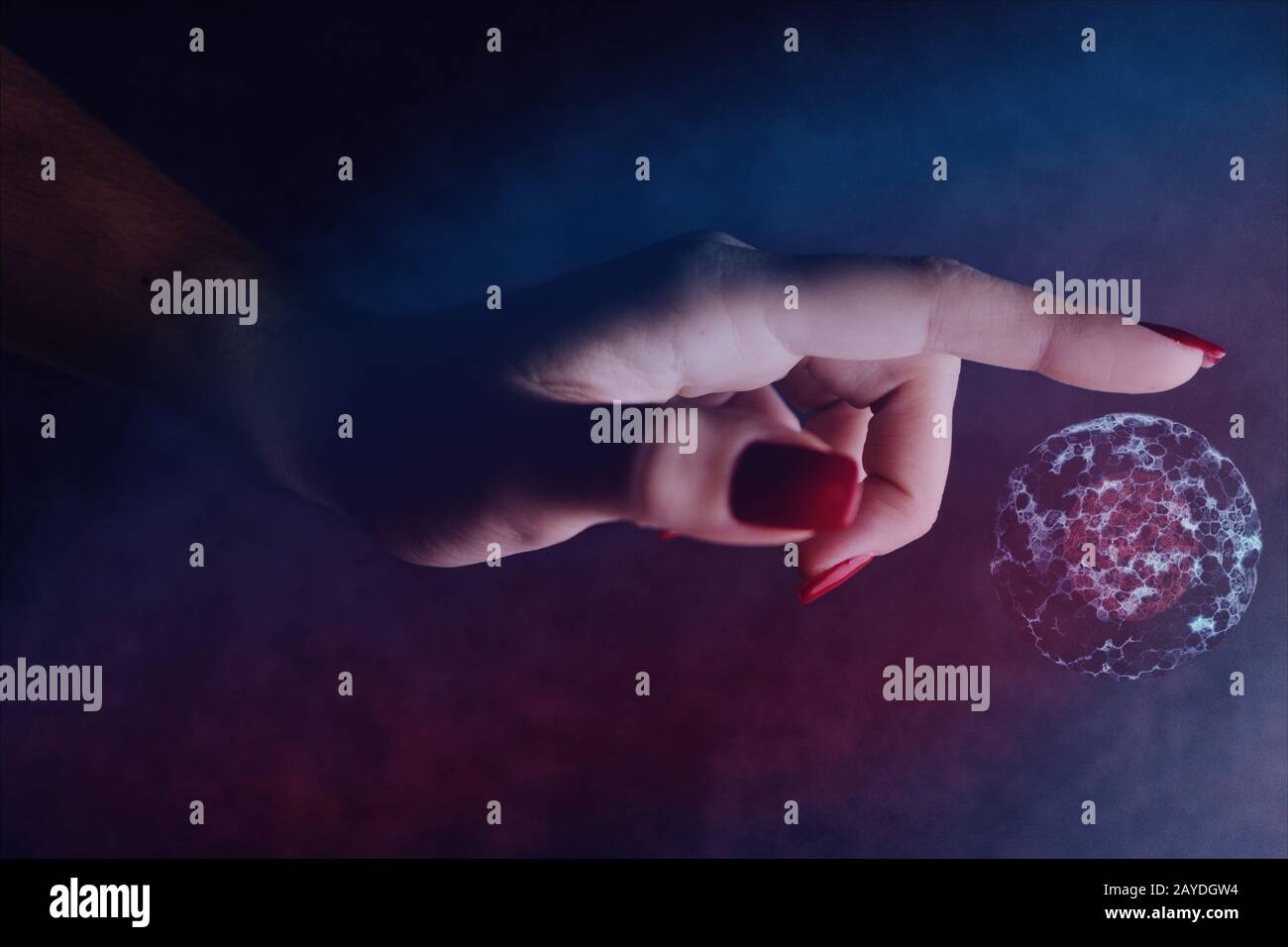 Donna forefinger tocca cella dividering.Nebula polvere in uno spazio infinito. Supporti misti. Foto Stock