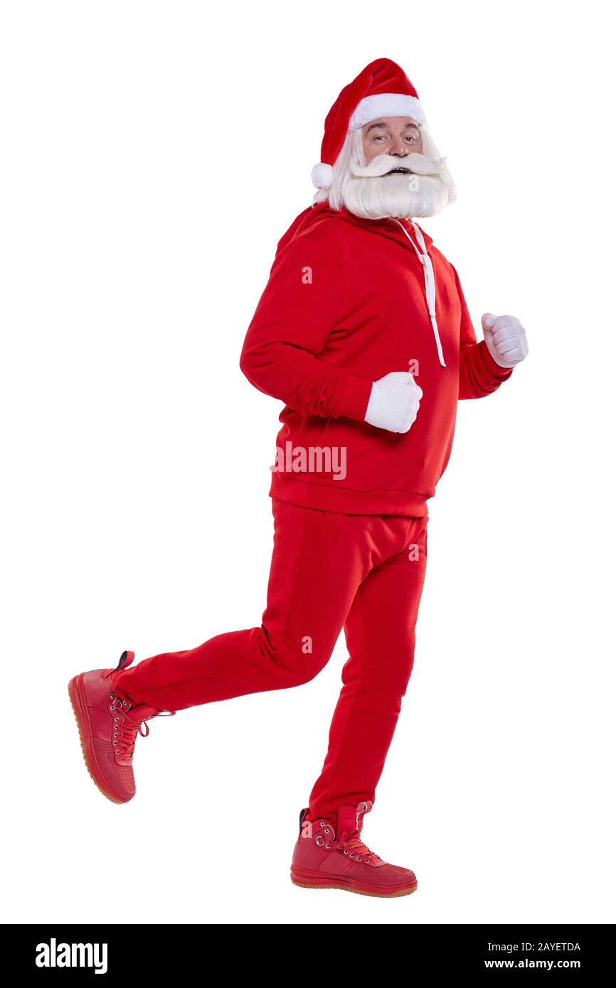 Ritratto di un Babbo Natale in rosso sportivo in piena crescita Foto Stock