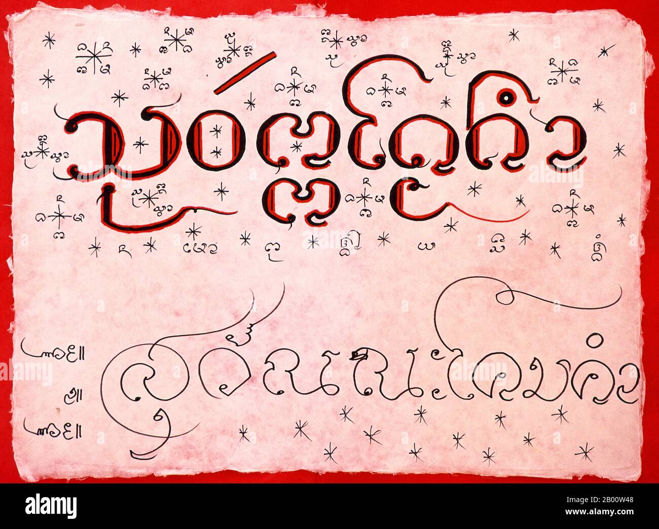 Thailandia: Northern Thai o Kham Mueang script su carta sa. La Thailandia del Nord o Kham Mueang è la lingua del popolo Khon Muang del nord della Thailandia ed è strettamente legata al Tailandese e al Laos. Parlato da circa sei milioni di persone. Foto Stock