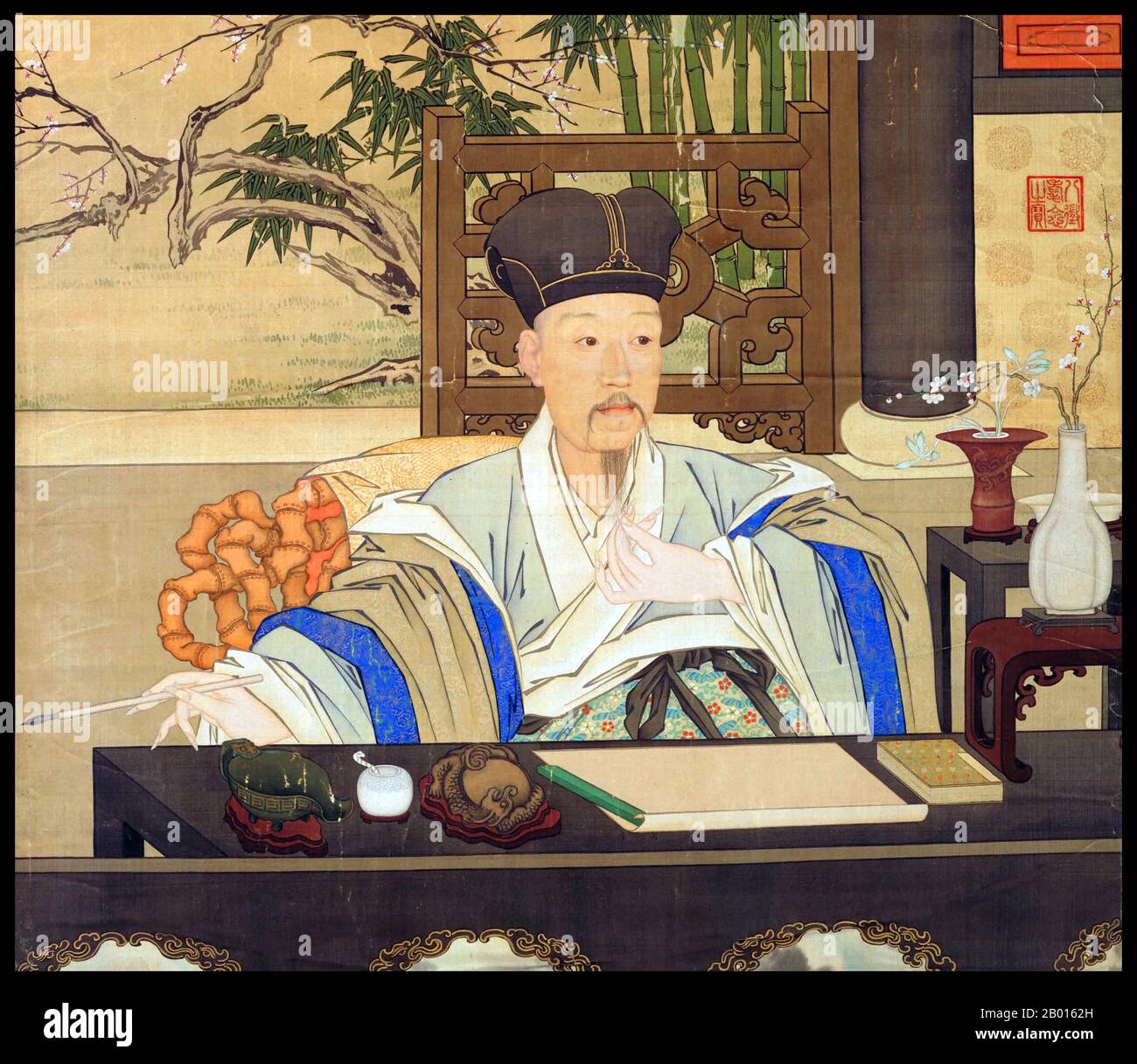 Cina: 'L'imperatore Qianlong nel suo studio'. Dipinto a scroll appeso di Giuseppe Castiglione (1688-1766), c.. 1750. L'imperatore Qianlong (25 settembre 1711 - 7 febbraio 1799), nato Hongli e il nome del tempio Gaozong, fu il quinto imperatore della dinastia Qing. Quarto figlio dell'imperatore Yongzheng, regnò ufficialmente dal 1735 al 1796, prima di abdicare a favore di suo figlio, l'imperatore Jiaqing - un atto filiale per non governare più a lungo di suo nonno, l'imperatore Kangxi. Nonostante il suo pensionamento, mantenne il potere ultimo fino alla sua morte. Foto Stock