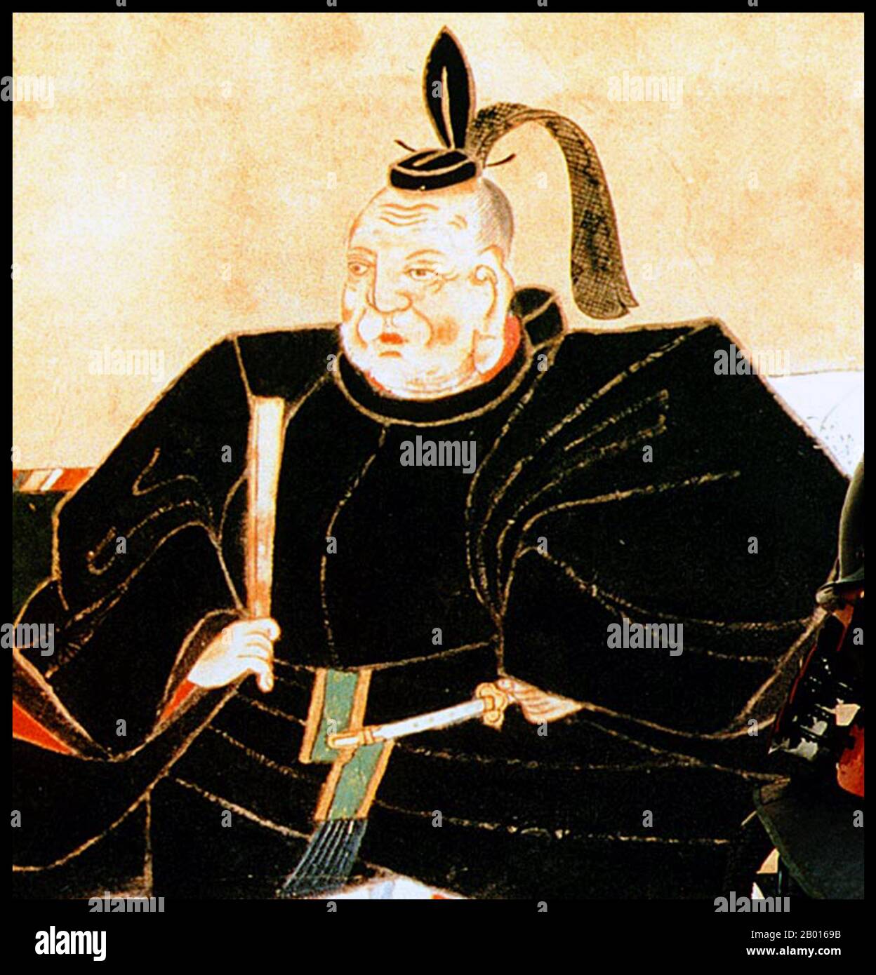 Giappone: Tokugawa Ieyasu (31 gennaio 1543 – 1 giugno 1616), fondatore e primo governatore dello Shogunato Tokugawa (1600-1868). Dipinto a scroll appeso di Kano Tan'yu (1602-1674), XVII secolo. Tokugawa Ieyasu, nato Matsudaira Takechiyo, fu il fondatore e primo shogun dello shogunato Tokugawa del Giappone, che governò dalla battaglia di Sekigahara nel 1600 fino alla Restaurazione Meiji nel 1868. Ieyasu prese il potere nel 1600, ricevette la nomina a shogun nel 1603, abdicò dal suo incarico nel 1605, ma rimase al potere fino alla sua morte nel 1616. Ieyasu fu postumo consacrato a Nikkō Tōshō-gū. Foto Stock