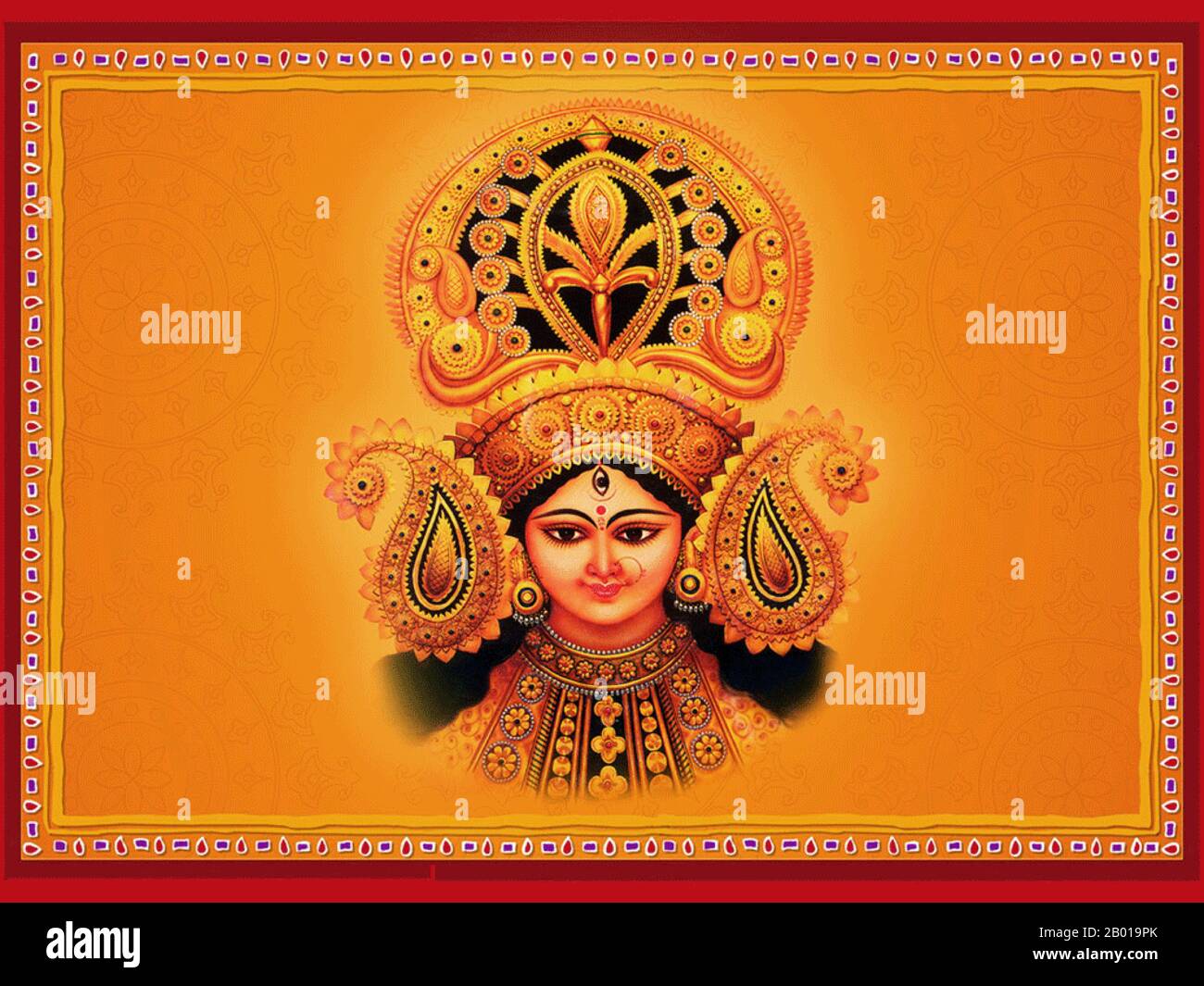 India: Navrati (Dussehra) immagine di Durga, la Divina Dea Madre. Navratri, Navaratri, o Navarathri è un festival indù di culto di Shakti. La parola Navaratri significa letteralmente 'nove notti' in Sanscrito, nava significa nove e ratri significa notte. Durante queste nove notti e dieci giorni, nove forme di Shakti/Devi sono adorate. È comunemente indicato come Dussehra. Si ritiene che l'usanza di celebrare Dussehra abbia avuto origine nel regno indù Deccan di Vijayanagar, con la sua capitale a Hampi, nel 14th secolo. Foto Stock