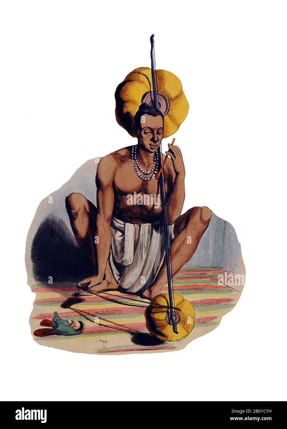 India: Uomo indù che gioca il pennak. Incisione colorata a mano di Edouard Vermoccken (1 novembre 1820 - 23 novembre 1906), c.. 1843-1844. Incisione colorata a mano da 'Moeurs, Usages, et Costumes de tous les Peuples de Monde, d'apres des Documents AUTHENTIQUES et les Voyages les Plus Rents', di Auguste Wahlen (1785-1850). Foto Stock