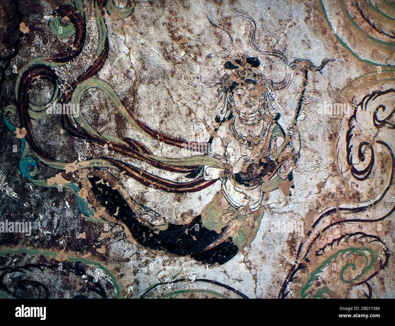 Cina: Musicista celeste, Cave 15, Yulin Caves, dinastia Tang (618-907). Le Grotte di Yulin sono un complesso di templi buddisti nella contea di Guazhou, provincia di Gansu, Cina. Il sito si trova a circa 100 km ad est dell'oasi cittadina di Dunhuang e delle Grotte di Mogao. Prende il nome dagli omonimi alberi di olmo che costeggiano il fiume Yulin, che scorre attraverso il sito e separa le due scogliere da cui sono state scavate le grotte. Le quarantadue grotte ospitano circa 250 statue policrome e 4.200 metri quadrati di dipinti murali, risalenti alla dinastia Tang e alla dinastia Yuan. Foto Stock