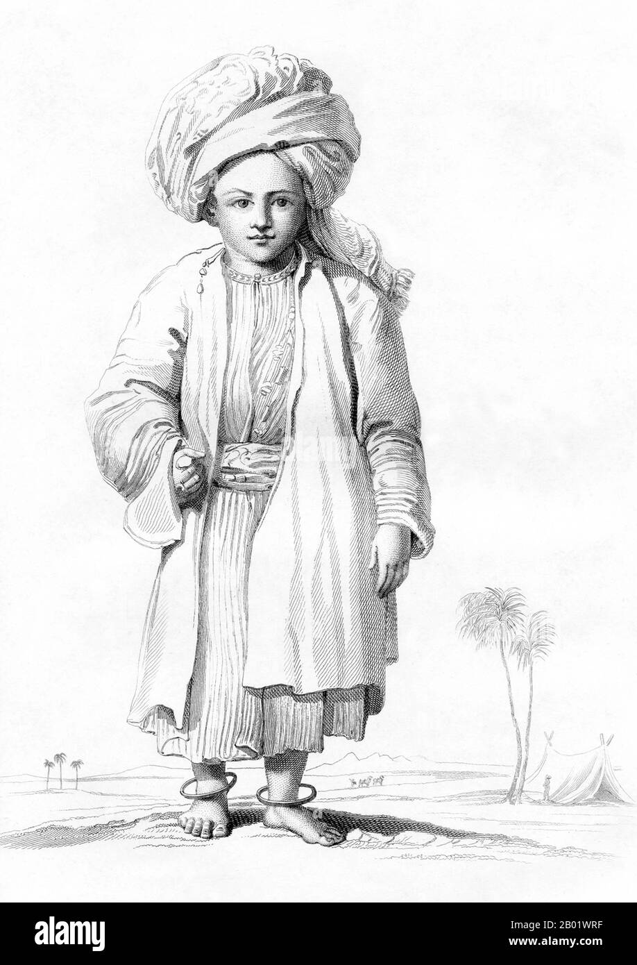 Yemen: Un ragazzo yemenita di Mocha sulla costa di Tihama del Mar Rosso vestito con i suoi migliori vestiti. Incisione di Charles Heath (1785-1848) dopo Henry Salt (1780-1827), c. 1814. Mocha o Mokha è una città portuale sulla costa del Mar Rosso dello Yemen. Fino a quando non fu eclissata nel XIX secolo da Aden e Hodeida, Mocha era il porto principale della capitale dello Yemen Sana'a.. Il Mocha è famoso per essere il principale mercato del caffè dal XV secolo fino al XVII secolo. Anche dopo aver trovato altre fonti di caffè, i chicchi di Mocha (chiamati anche Sanani o Mocha Sanani, che significa Sana'a) continuarono ad essere apprezzati. Foto Stock