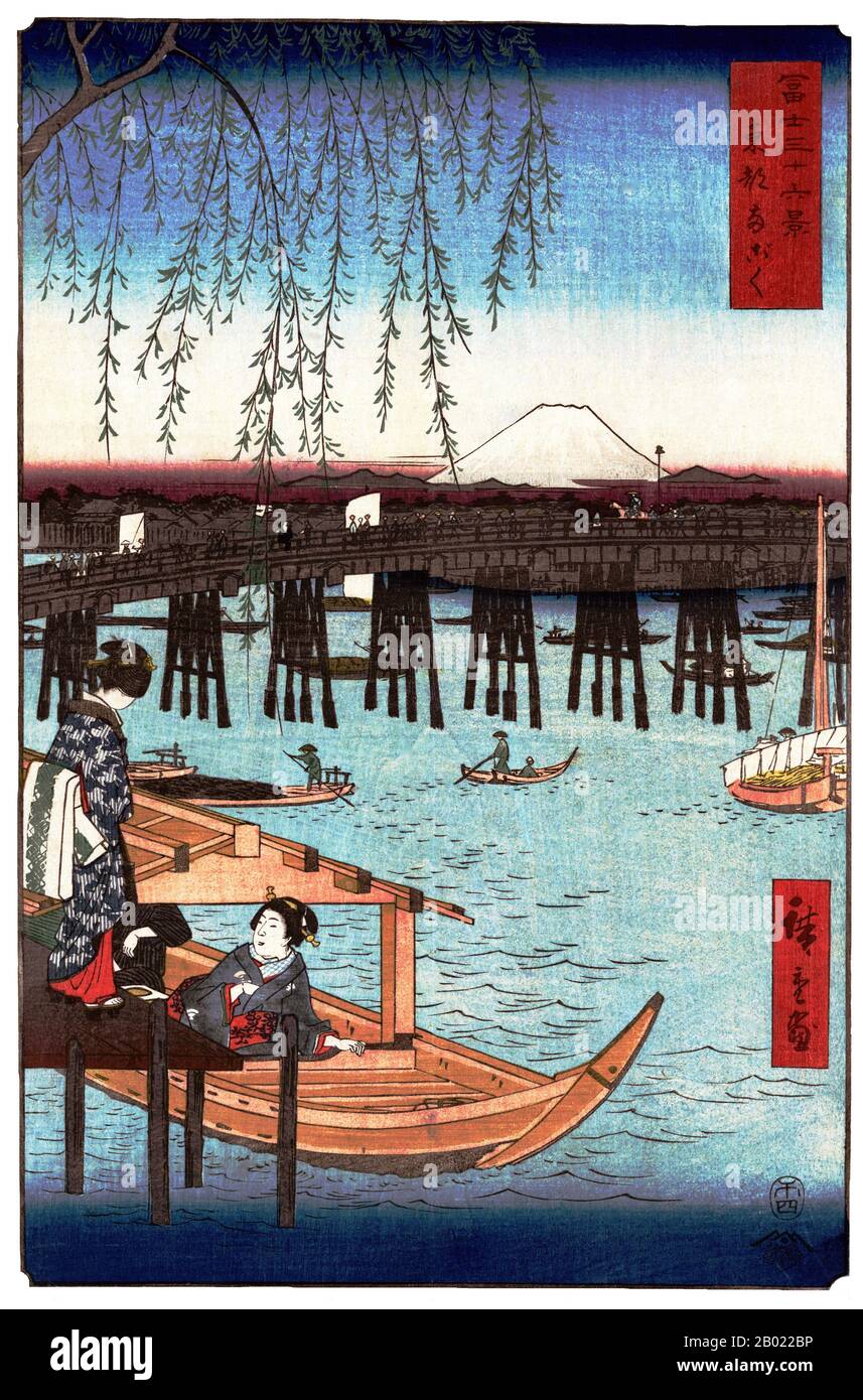 Giappone: Tōto Ryōgoku: Ryōgoku nella capitale orientale. Stampa in legno ukiyo-e dalla serie '36 Views of Mount Fuji' di Utagawa Hiroshige (1797-1858), 1858. Trentasei vedute del Monte Fuji è il titolo di due serie di stampe in legno dell'artista giapponese Andō Hiroshige, raffiguranti il Monte Fuji in diverse stagioni e condizioni meteorologiche da una varietà di luoghi e distanze diversi. Le serie 1852 sono orientate in orizzontale; le serie 1858 sono orientate in verticale. Foto Stock