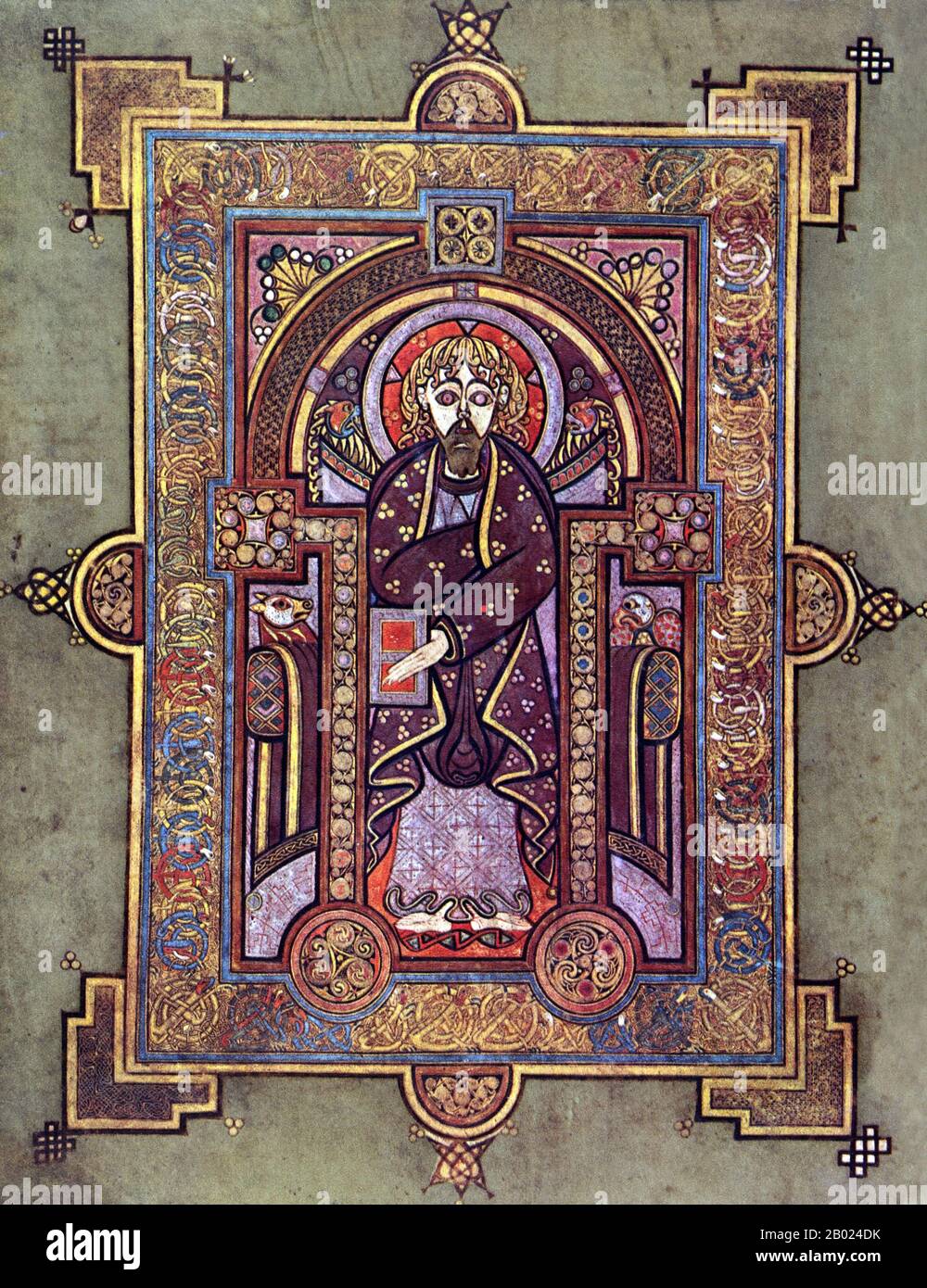 Irlanda/Scozia: Ritratto di San Matteo. Il Libro di Kells, c. 800 d.C. Il Libro di Kells (irlandese: Leabhar Cheanannais) (Dublino, Trinity College Library, MS A. I. (58), a volte noto come il Libro di Columba) è un manoscritto miniato evangelico in latino, contenente i quattro Vangeli del nuovo Testamento insieme a vari testi e tabelle prefatori. Fu creato dai monaci celtici intorno al 800 o poco prima. Il testo dei Vangeli è in gran parte tratto dalla Vulgata, anche se include anche diversi passaggi tratti dalle versioni precedenti della Bibbia nota come Vetus Latina. Foto Stock