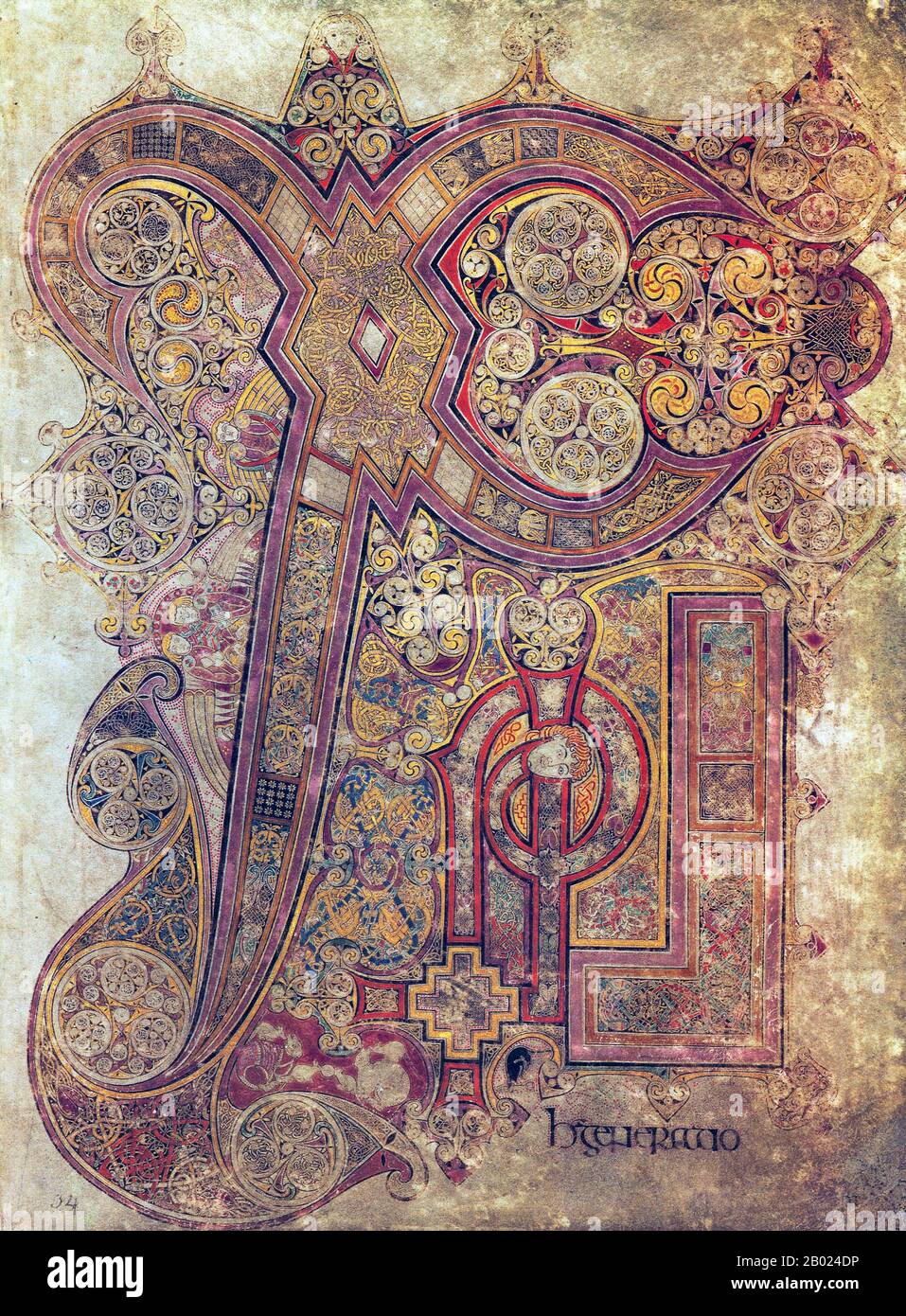 Irlanda/Scozia: The Book of Kells, c. 800. Matteo 1:18, la celebre pagina chi-rho. Chi e rho sono le prime due lettere della parola Cristo in greco. Il Libro di Kells (irlandese: Leabhar Cheanannais) (Dublino, Trinity College Library, MS A. I. (58), a volte noto come il Libro di Columba) è un manoscritto miniato evangelico in latino, contenente i quattro Vangeli del nuovo Testamento insieme a vari testi e tabelle prefatori. Fu creato dai monaci celtici intorno al 800 o poco prima. Il testo dei Vangeli è in gran parte tratto dalla Vulgata. Foto Stock