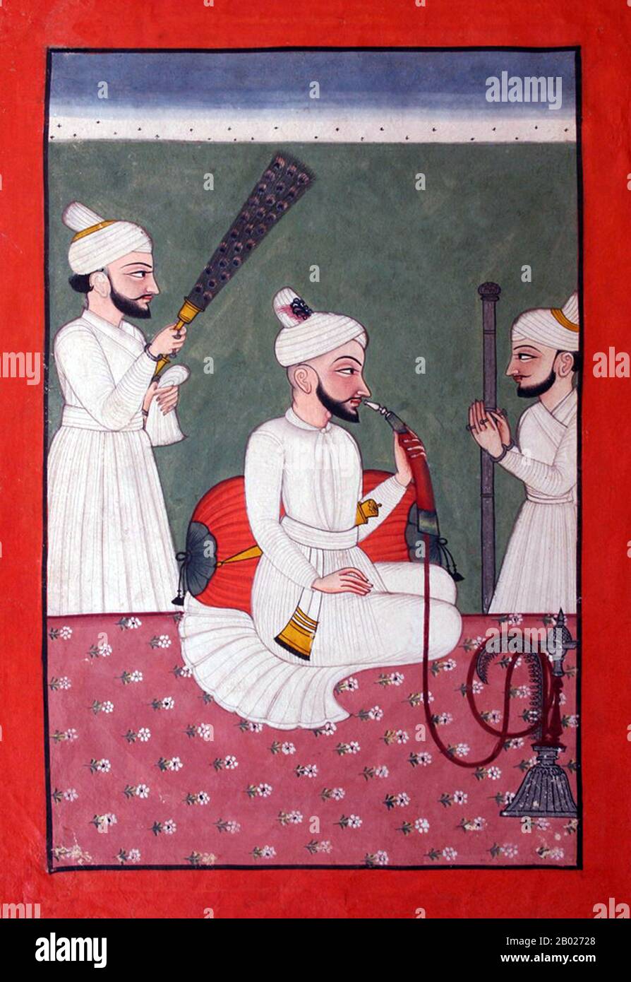 India: Surma Sen, Raja di Mandi (r. 1781-1788), fumando una pipa d'acqua. Mandi. Pittura ad acquerello in miniatura, c. 1785. Lo Stato di Mandi fu uno stato principesco all'interno dell'Unione dell'India dal 1950 al 1956 con Bilaspur come capitale. Lo stato di Mandi (il nome significa "mercato" in Hindi), che comprende due città e 3.625 villaggi, si trovava nella catena montuosa dell'Himalaya, confinante ad ovest, a nord e ad est con il distretto punjabi britannico di Kangra; a sud, su Suket; e a sud-ovest, su Bilaspur. Foto Stock