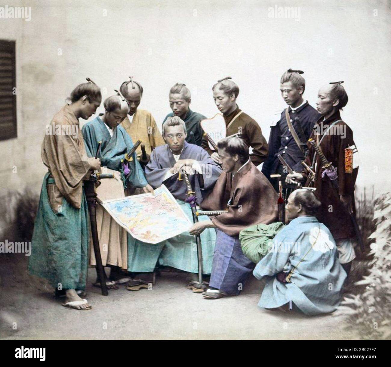 La guerra di Boshin (戊辰戦争 Boshin Sensō) fu una guerra civile in Giappone, combattuta dal 1868 al 1869 tra le forze del governo Tokugawa Shogunate e quelle che cercano di restituire il potere politico alla corte imperiale. La guerra ha trovato le sue origini in insoddisfazione tra molti nobili e giovani samurai con la gestione shogunate degli stranieri dopo l'apertura del Giappone durante il decennio precedente. Un'alleanza di samurai occidentali (in particolare i domini di Chōshū, Satsuma e Tosa) e funzionari di corte si assicurarono il controllo della corte imperiale e influenzarono il giovane imperatore Meiji. Tokugawa Yoshinobu, la seduta s Foto Stock