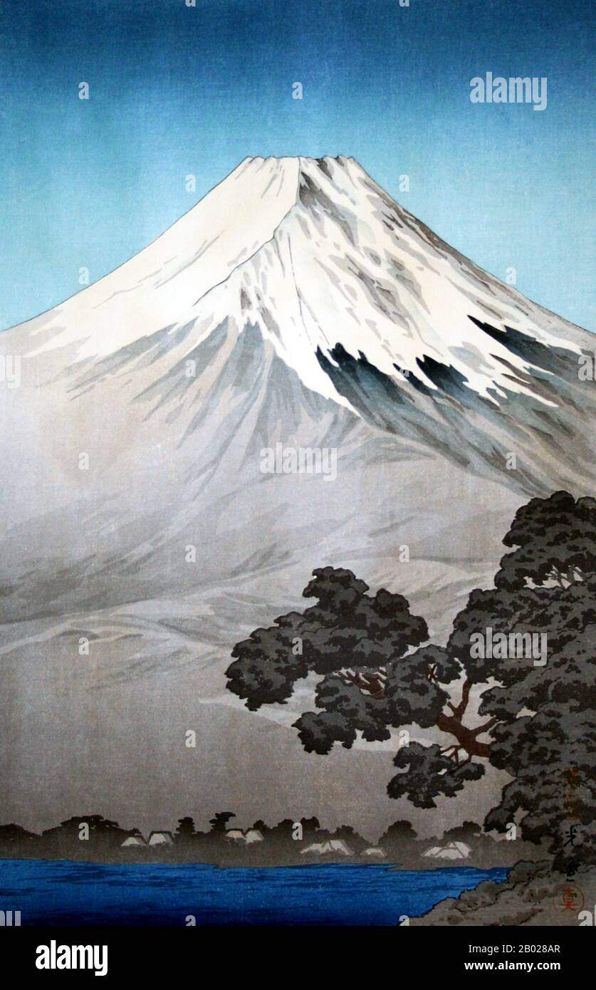 Giappone: "Lago Yamanaka sotto il Monte Fuji". Shin Hanga ukiyo-e Woodblock print di Tsuchiya Koitsu (23 settembre 1870 - 13 novembre 1949), 1938. Tsuchiya Koitsu era un artista del movimento Shin Hanga. Si è formato sotto il maestro ukiyo-e Kobayashi Kiyochika per 19 anni, e le sue opere iniziali si sono concentrate su scene della prima guerra sino-giapponese. Shin hanga ("nuove stampe") è stato un movimento artistico del Giappone all'inizio del XX secolo, durante i periodi Taishō e Shōwa, che rivitalizzò l'arte tradizionale ukiyo-e radicata nei periodi Edo e Meiji (XVII-XIX secolo). Foto Stock