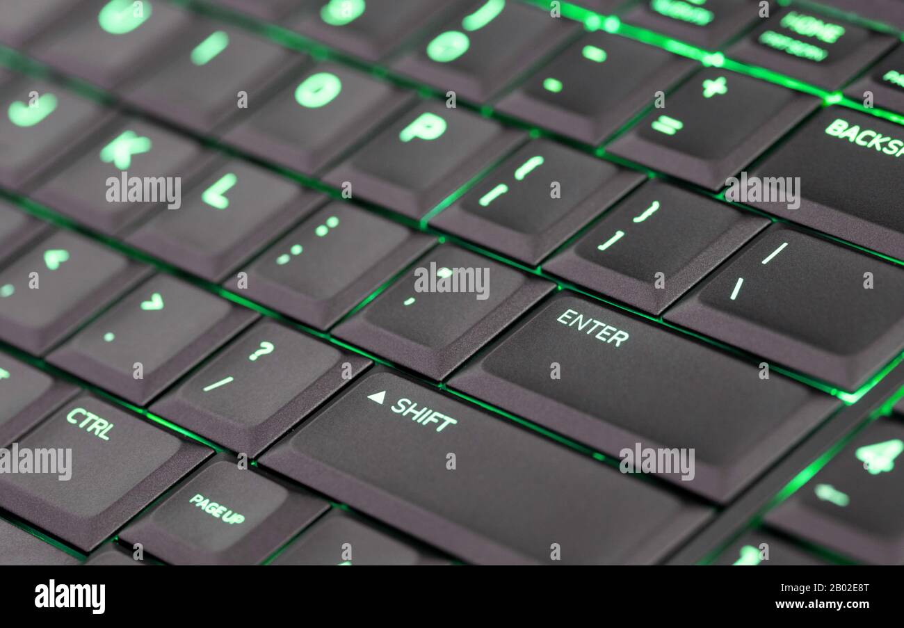 Computer portatile con tastiera retroilluminata a LED, verde Foto stock -  Alamy