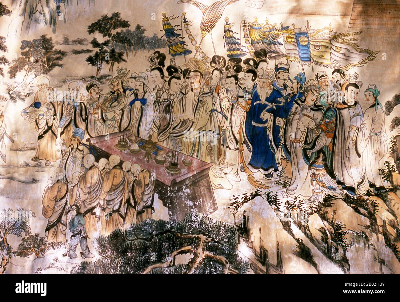 "Viaggio verso l'Occidente" è uno dei Quattro Grandi Romanzi classici della letteratura cinese. Originariamente pubblicato anonimamente nel 1590s durante la Dinastia Ming, la sua paternità è stata attribuita allo studioso Wu Cheng'en dal 20th secolo. Nei paesi di lingua inglese, il racconto è anche spesso conosciuto semplicemente come Scimmia. Il romanzo è un racconto fictionalizzato del leggendario pellegrinaggio in India del monaco buddista Xuanzang. Il monaco viaggiò nelle regioni occidentali durante la dinastia Tang, per ottenere testi sacri (sūtras). Il Bodhisattva Guan Yin, su istruzione del Buddha, dà questo compito Foto Stock