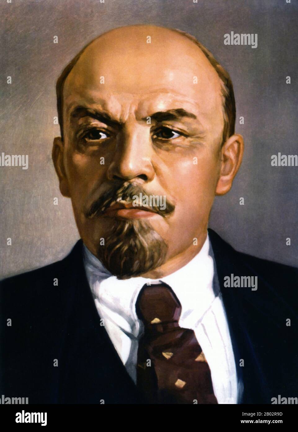 Vladimir Ilyich Lenin, nato Vladimir Ilyich Ulyanov (22 aprile 1870 – 21 gennaio 1924), è stato un . Lenin fu il capo della Repubblica socialista federativa sovietica russa dal 1917, e poi contemporaneamente come Premier dell'Unione Sovietica dal 1922, fino alla sua morte. Sotto la sua amministrazione, l'impero russo si disintegrò e fu sostituito dall'Unione Sovietica, uno stato costituzionalmente socialista monopartitico; tutta la ricchezza, compresi terra, industria e affari, fu nazionalizzata. Basato nel marxismo, i suoi contributi teorici a ma Foto Stock