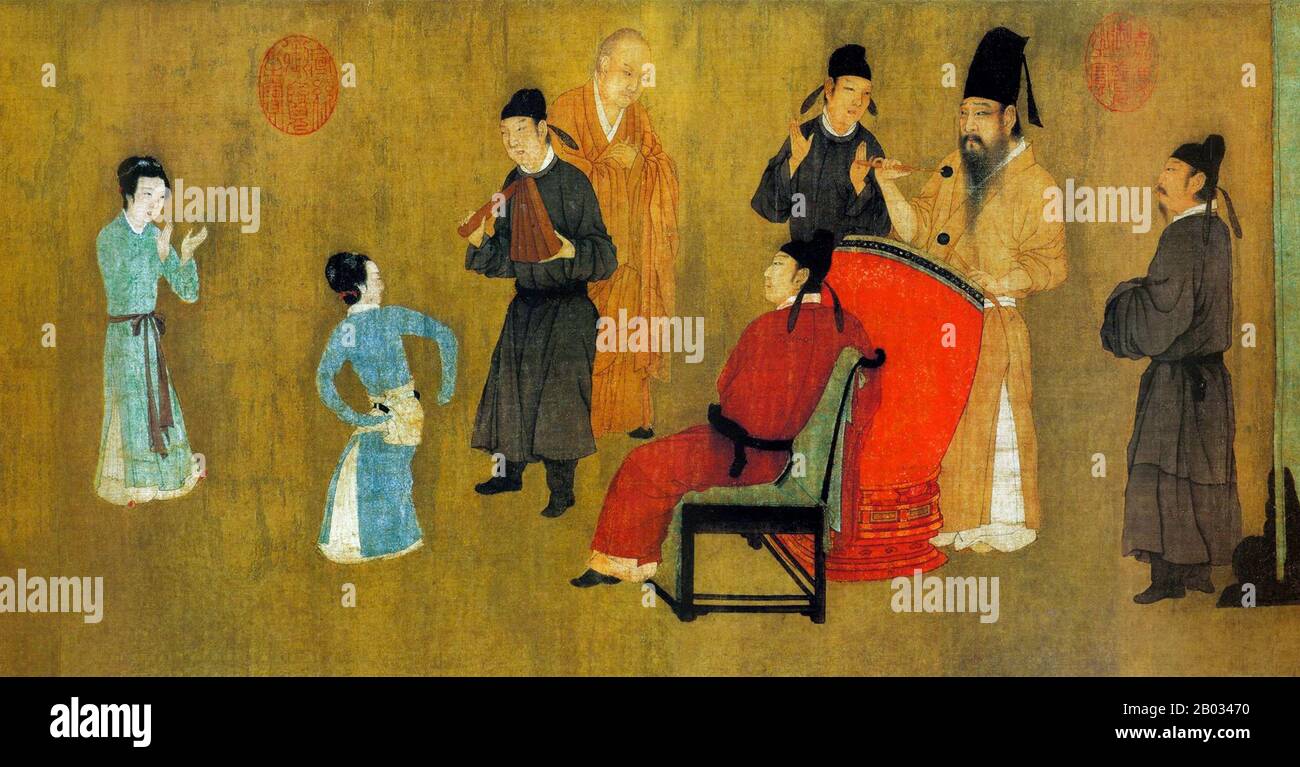 'The Night Revels of Han Xizai' è un rotolo dipinto raffigurante Han Xizai, un ministro dell'imperatore Tang meridionale li Yu (937-978). Questo dipinto narrativo è diviso in cinque sezioni distinte: Han Xizai ascolta la pipa, guarda i ballerini, prende un riposo, ascolta la musica, e poi vede gli ospiti fuori. L'originale, dipinto da GU Hongzhong (937-975), è perso, ma una copia del 12th secolo, ospitato nel Museo del Palazzo di Pechino, sopravvive (qui riprodotto). Lo scorrimento completo deve essere visualizzato da destra a sinistra. Foto Stock
