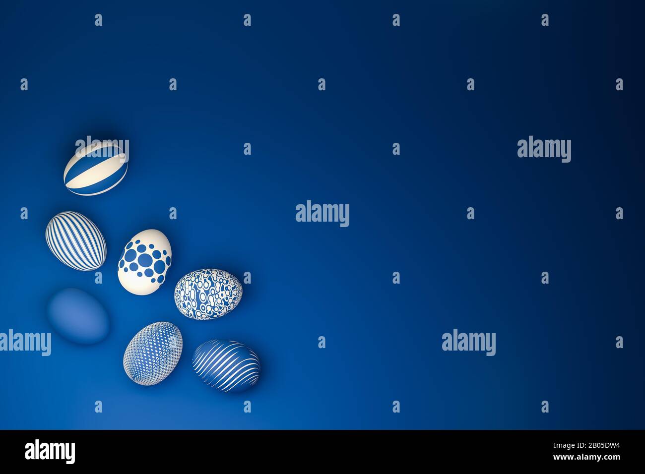 Uova di Pasqua con diverse texture in classico blu su sfondo blu senza cuciture. Vista ad angolo elevato Foto Stock