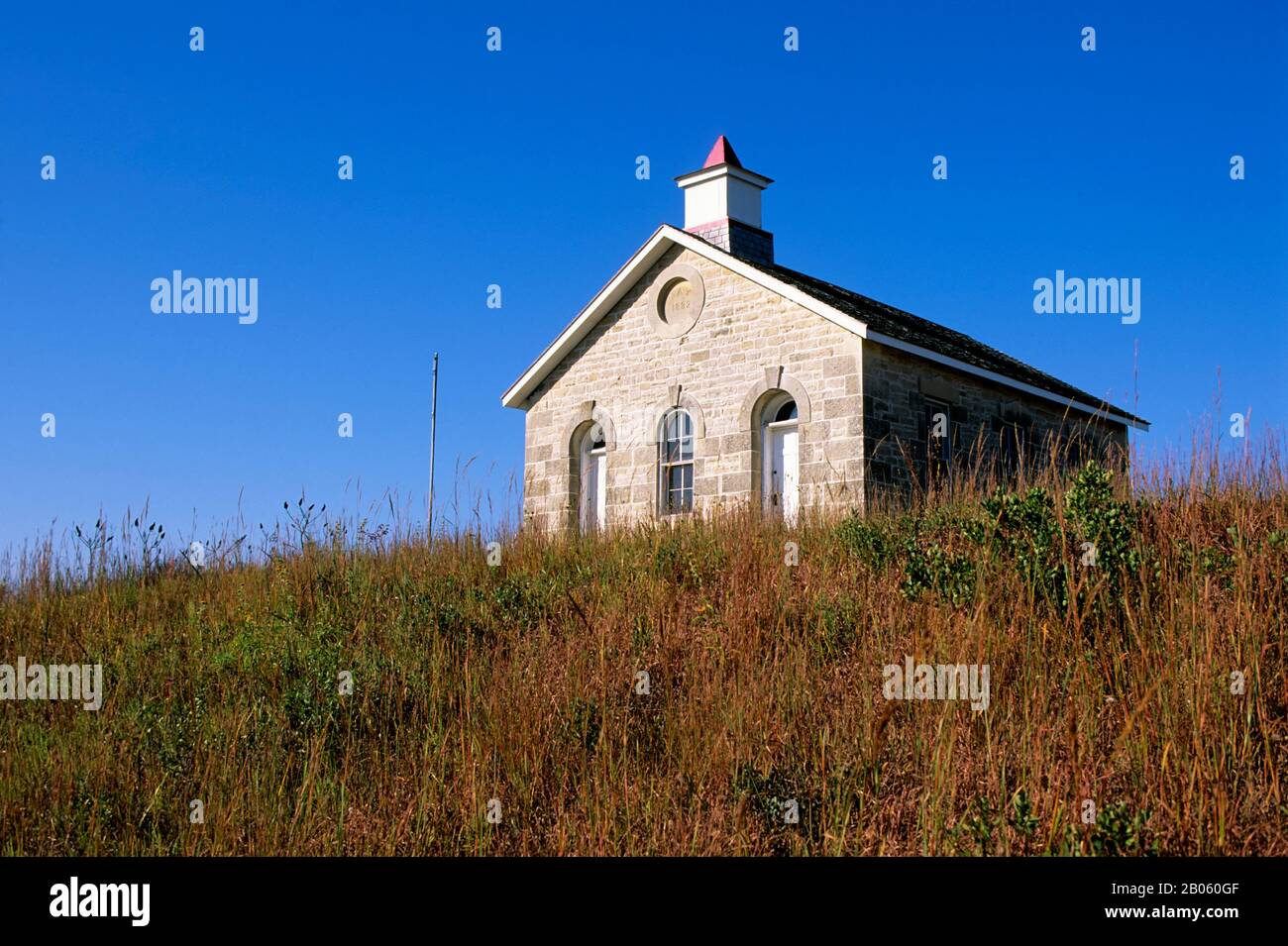 USA, KANSAS, COLLINE SELCE, VICINO ALLA CITTÀ FORTE, TALLGRASS PRAIRIE NATIONAL PRESERVE, SCHOOLHOUSE Foto Stock
