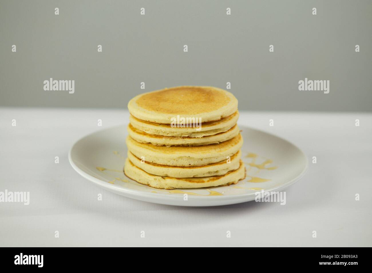 Pancake con miele da gustare Foto Stock