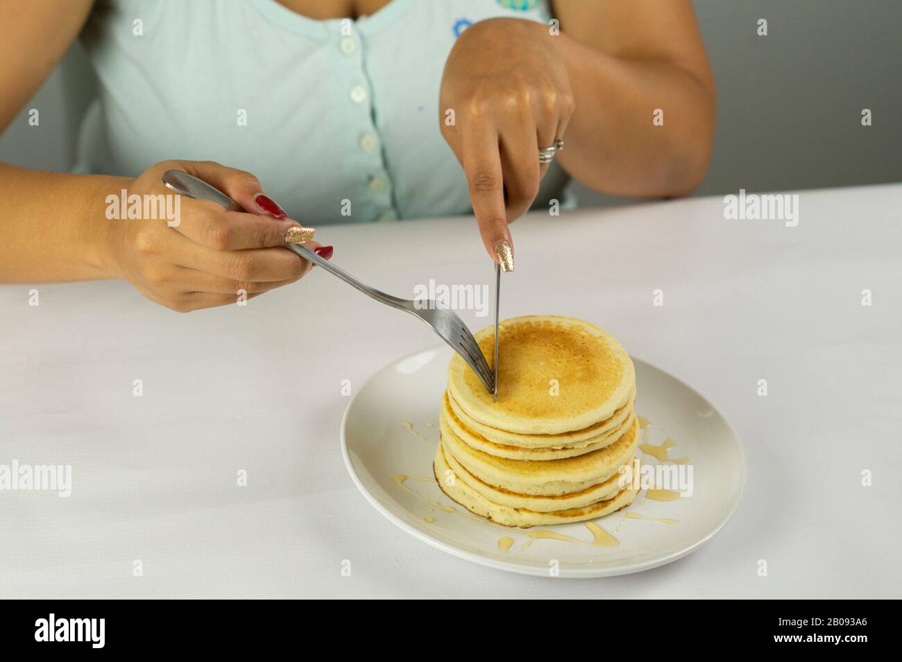 Pancake con miele da gustare Foto Stock