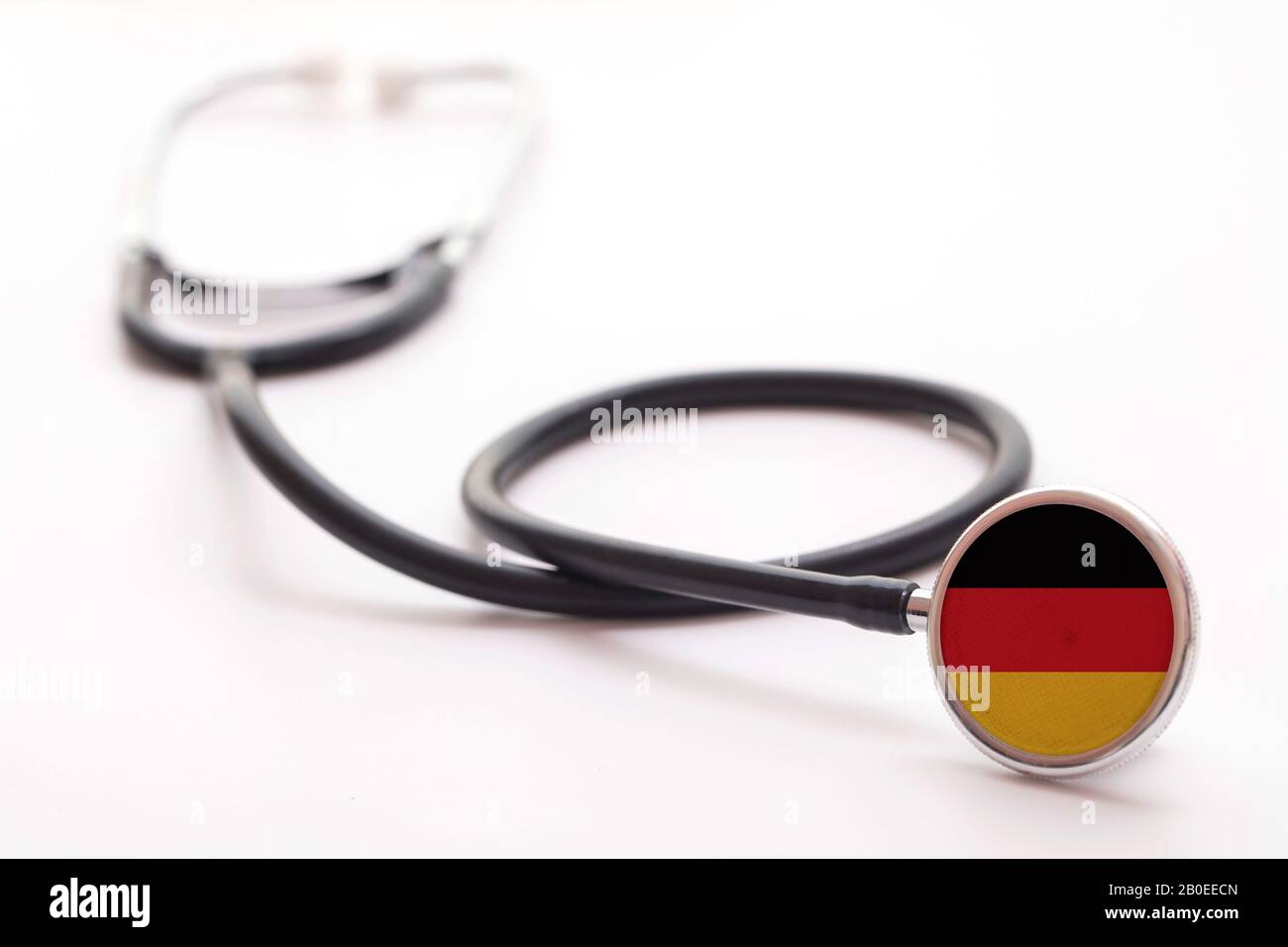 Concetto di assistenza sanitaria in Germania. Stetoscopio medico con bandiera del paese Foto Stock