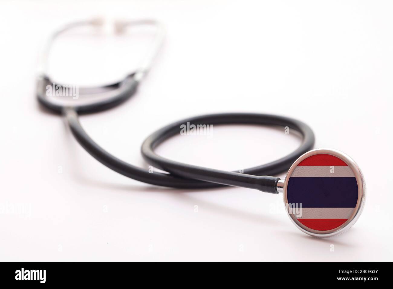 Thailandia concetto di assistenza sanitaria. Stetoscopio medico con bandiera del paese Foto Stock