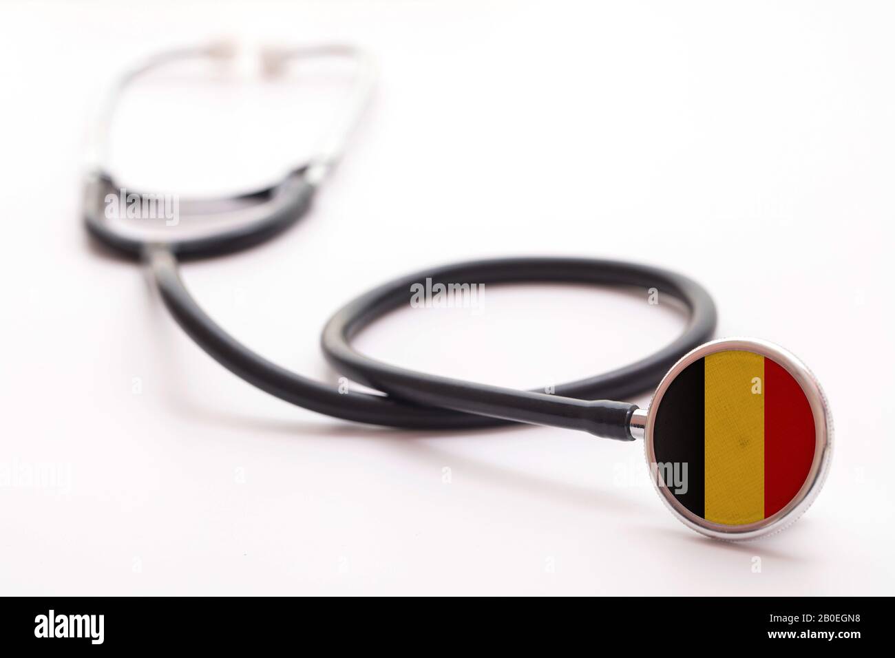 Concetto di assistenza sanitaria in Belgio. Stetoscopio medico con bandiera del paese Foto Stock