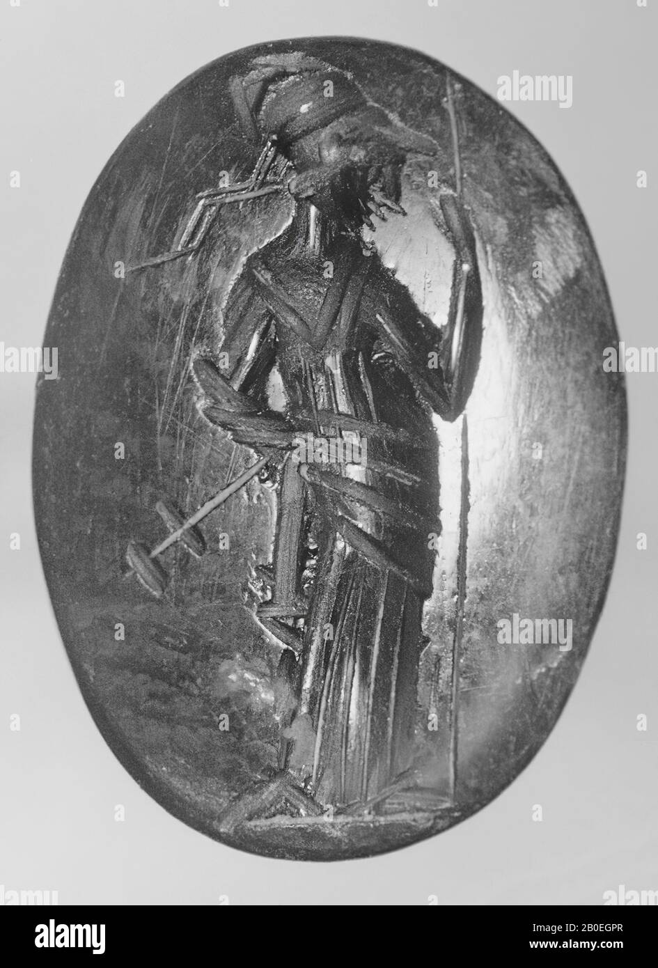 La dea Helmeted Minerva ha nella sua mano sinistra una lancia e nella sua mano destra uno staff, guarda verso il basso a destra., Gem, intaglio, ringstone, pietra, carnelian, colore: Arancio, opaco, Forma: Ovale, in piedi, Lavorato: Maaskant-Kleibink, M., Catalogo delle gemme incise nel Royal Coin Cabinet, 1978, pag.60, fig.2, tipo 4A, 14 x 10 mm. Spessore 3 mm., 2nd - 3rd secolo dopo Chr. 100-300, Paesi Bassi, Limburgo, sconosciuto, sconosciuto Foto Stock